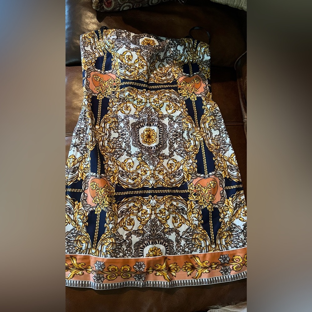 Strapless gorgeous dress new without tags. Size 4.